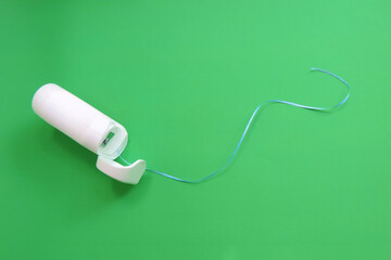      dental floss on a green background
   