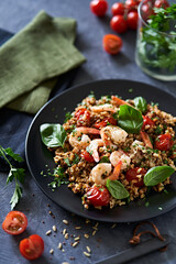 Seeds with tomatoes, basil and shrimps