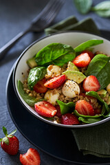 vegetable salad with mozarella cheese and spinach and seeds