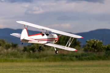 R/C airplane landing on the grass