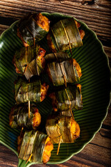 Naklejka premium Homemade pandan fried chicken, south east Asia food.