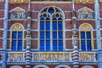 Architectural fragments of the famous Amsterdam Rijksmuseum building (1885). Amsterdam Rijksmuseum holds many masterpiece paintings of Dutch and world art. Amsterdam, the Netherlands.