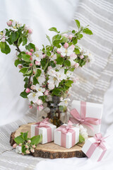 Vase with flowers. Gift boxes wiyh powdery ribbon.  Silver bracelet with charms is best gift box for the New Year and Christmas. Best gift for Valentines Day and Mothers day, birthday. 