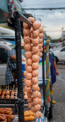 homemade sausage ball grilled is for sell in local market Thailand