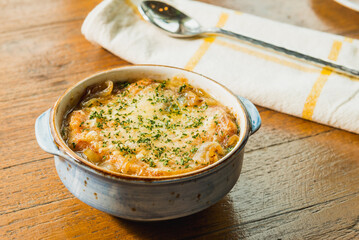 French onion soup on a wood table 