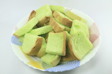 Close up of steamed bread and pandan custard.