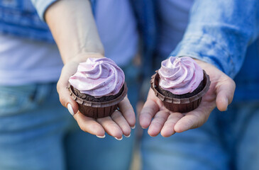 a man holding a chocolate candy