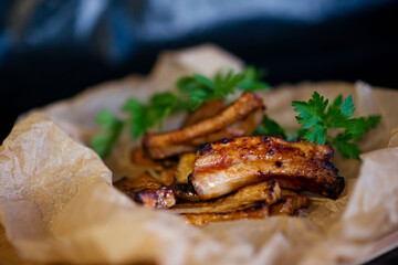 Delicious barbecued pork ribs served with parsley