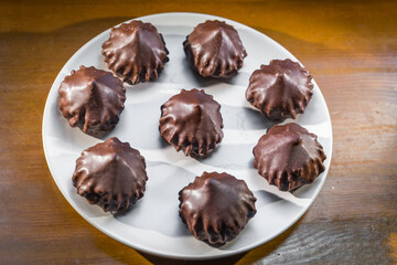 chocolate candies on a white background