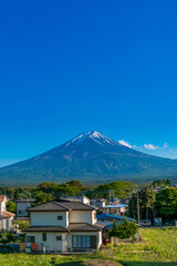 Mt Fuji and japanese house around the Kawaguchiko train station, Japan
