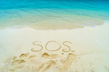 Beautiful sunny beach by the blue sea. Inscription