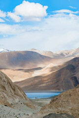 Fototapeta na wymiar Landscape image of Pangong lake and mountains view background in Ladakh, India. Pangong is an endorheic lake in the Himalayas situated at a height of about 4,350 m.