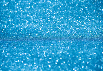 Sparkling lights festive background. Winter card. Glowing magic bokeh