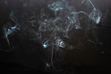 White smoke isolated on black background. smoke stock image