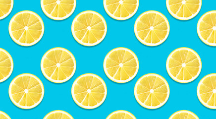 Lemon pattern on blue color background. Space for text. Summer wallpaper. Top view fruit minimal concept.