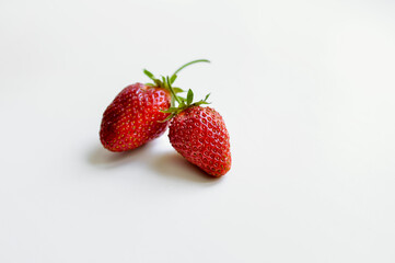 
Red strawberries on a white background. Natural eco-product.