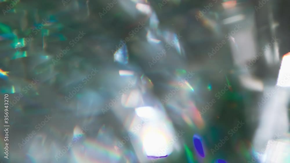 Wall mural emerald gemstone overflows. loop. the light passes through the facets of a slowly rotating diamond a