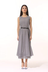 business woman executive posing in formal striped long skirt summer dress