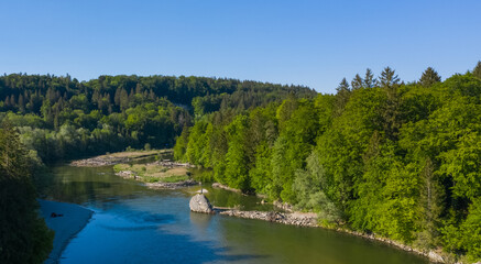 Fototapeta na wymiar Bird view of Isar river near Baierbrunn with forest around. Typical alpine landscape.