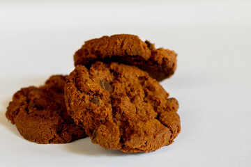 dark chocolate chip cookies on a white background