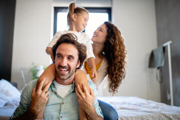 Happy family having fun times at home