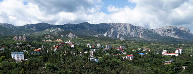 Fototapeta premium Panorama of the resort Simeiz city on background of the Crimean mountains