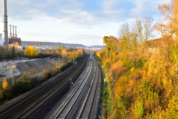 Autumn railroad receding into the distance
