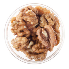 Walnuts in glass bowl isolated on white background flat lay closeup view