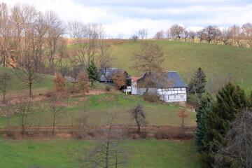 A nice half-timbered house embedded in green landscape in Germany