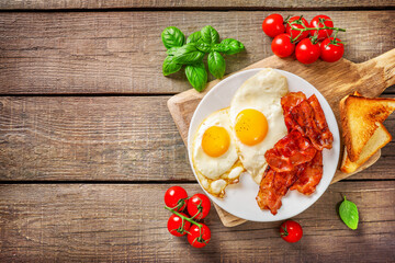 Traditional american breakfast with bacon and eggs