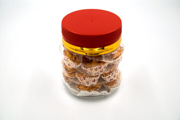 Corn flake biscuit over white background