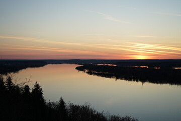 Obraz premium sunset over the river