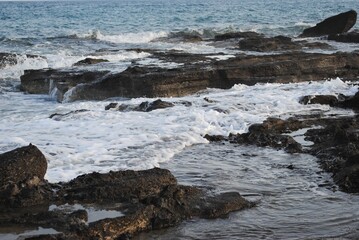 waves breaking on the rocks