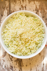 Elderflower, flowers in bowl, making elderflower cordial. 