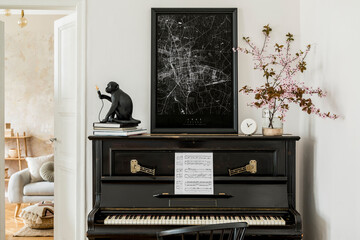 Fototapeta na wymiar Stylish composition at living room interior with black piano, mock up poster map, dried flowers, white clock, design lamp and elegant presonal accessories in modern home decor.