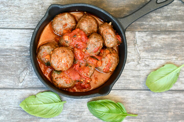 Tasty home made    italian  dish mini  meatballs baked in marinara tomato  sauce