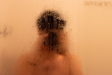 man take a picture on the bathroom wet mirror dew blur textured