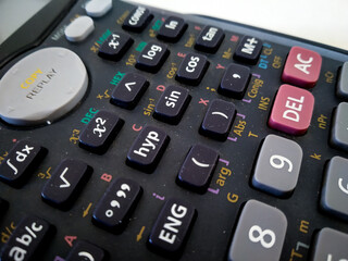 close up of scientific calculator isolated with white background