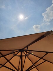 beach umbrella against blue sky