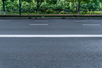 Obraz premium Asphalt road and park green forest landscape