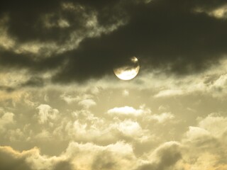 Sunset with Clouds and Sun Partiallt Hidden