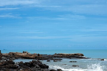 Wave crashing on the rocky reef