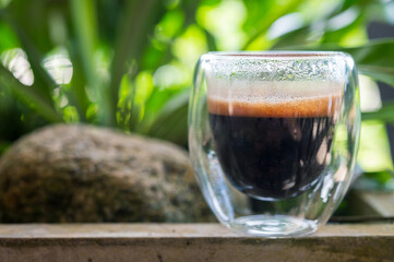 Cup of espresso on the table