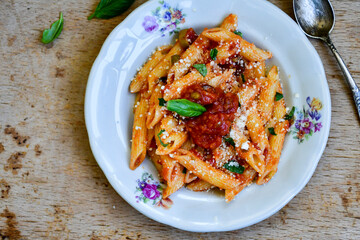  Home made penne pasta with tomato sauce bolgonee 