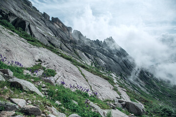 Mountain of nature reserve in Russia covered with fog 