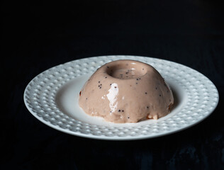 Chocolate milk jelly on a white plate