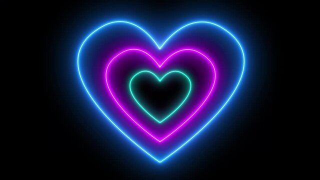 Glowing colorful neon heart lights. Neon colorful hearts on a black background. Loop. 