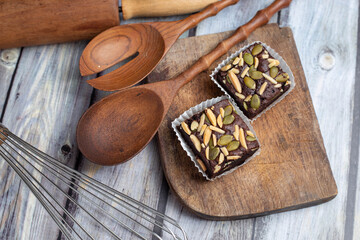 Homemade dark chocolate fudge brownies cake topping with Grains