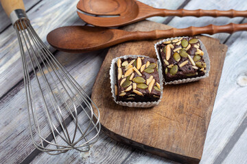 Homemade dark chocolate fudge brownies cake topping with Grains