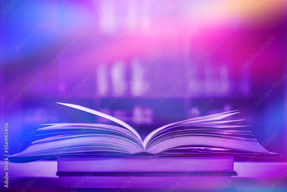 Poster stack of books in the library and blur bookshelf background
